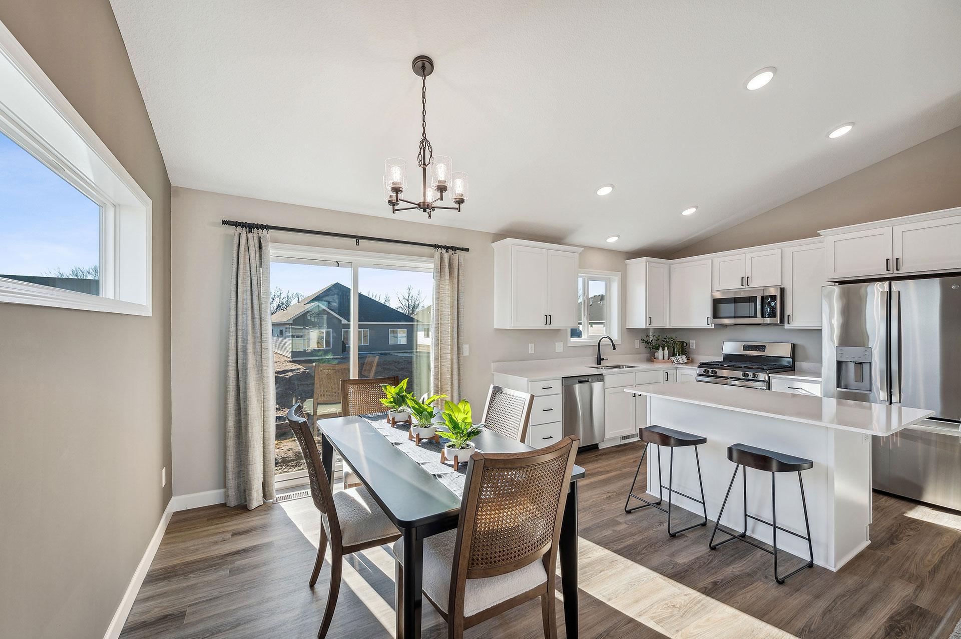 Dining - photo of a staged model home of the same floorplan. Selections may be different.