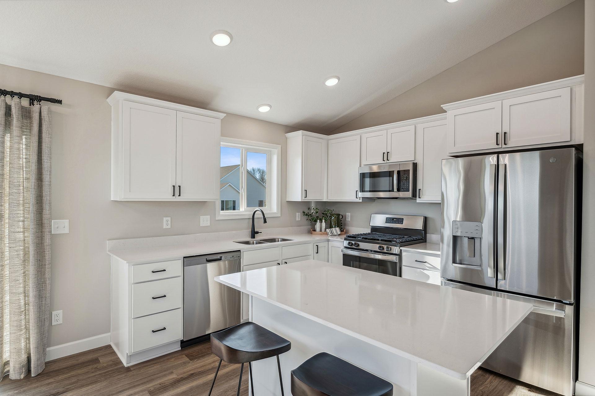 Kitchen - photo of a staged model home of the same floorplan. Selections may be different.