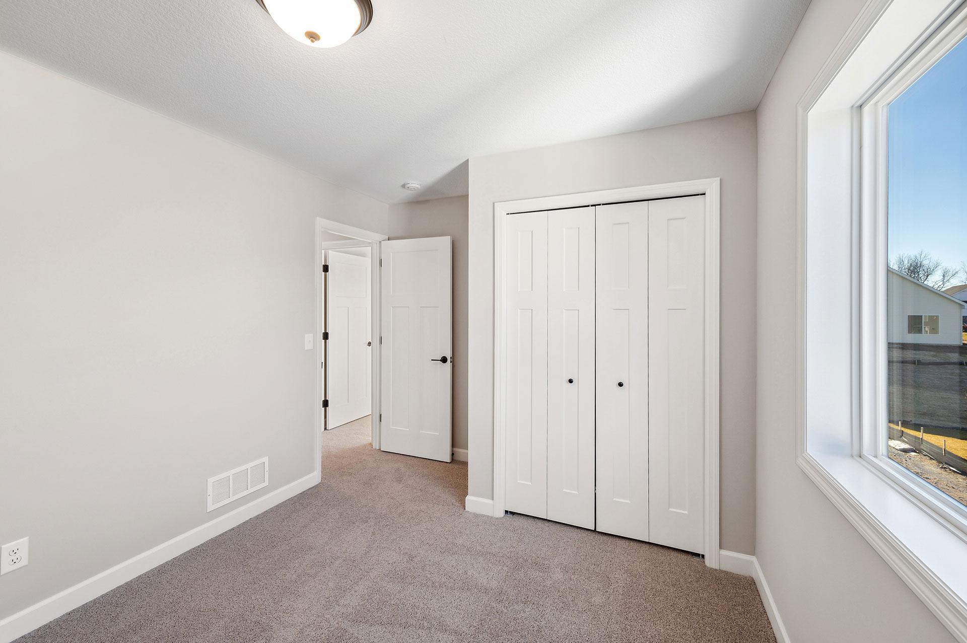 Bedroom - photo of model home of the same floorplan. Selections may be different.