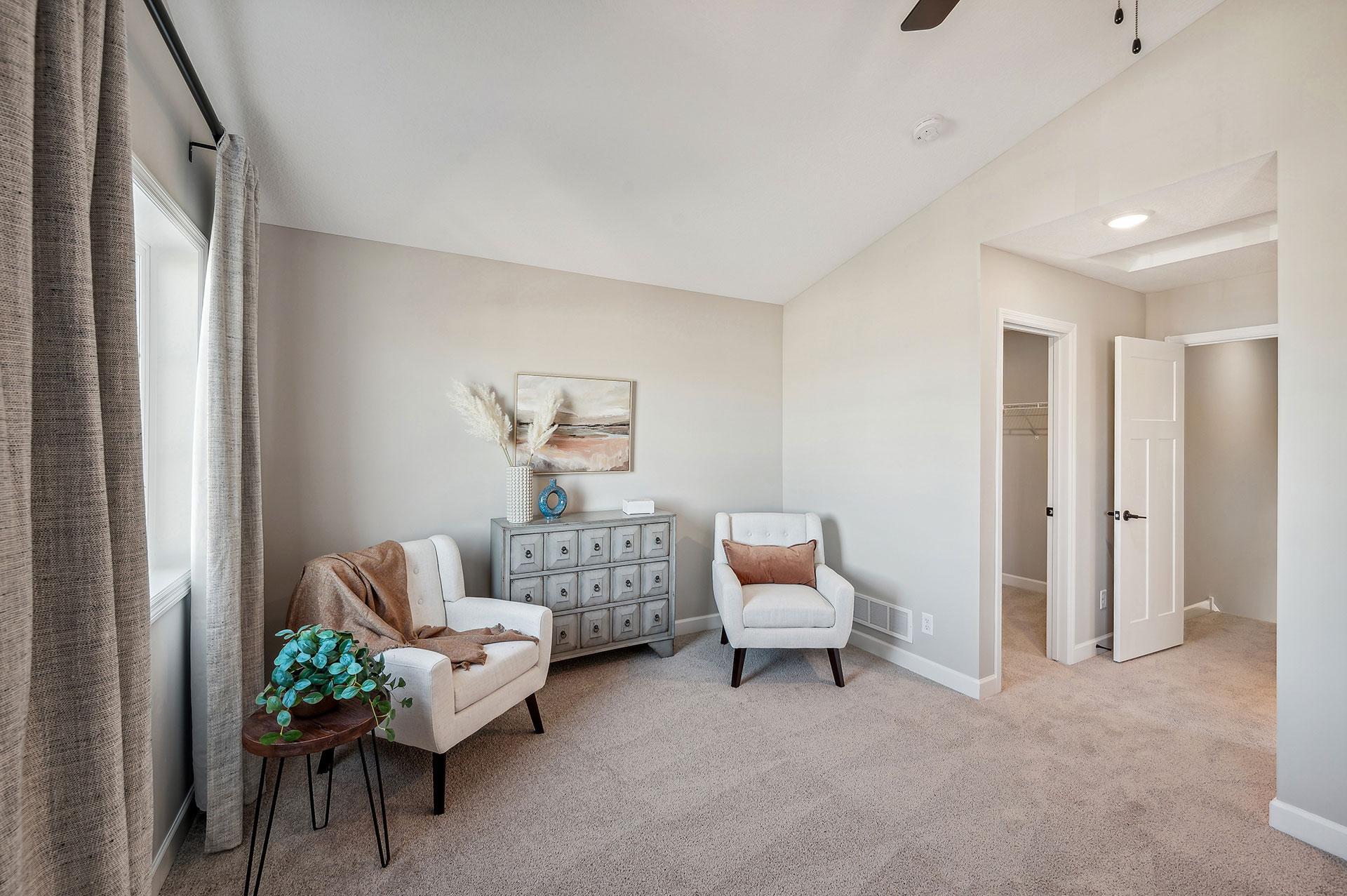 Primary Bedroom - photo of a staged model home of the same floorplan. Selections may be different.