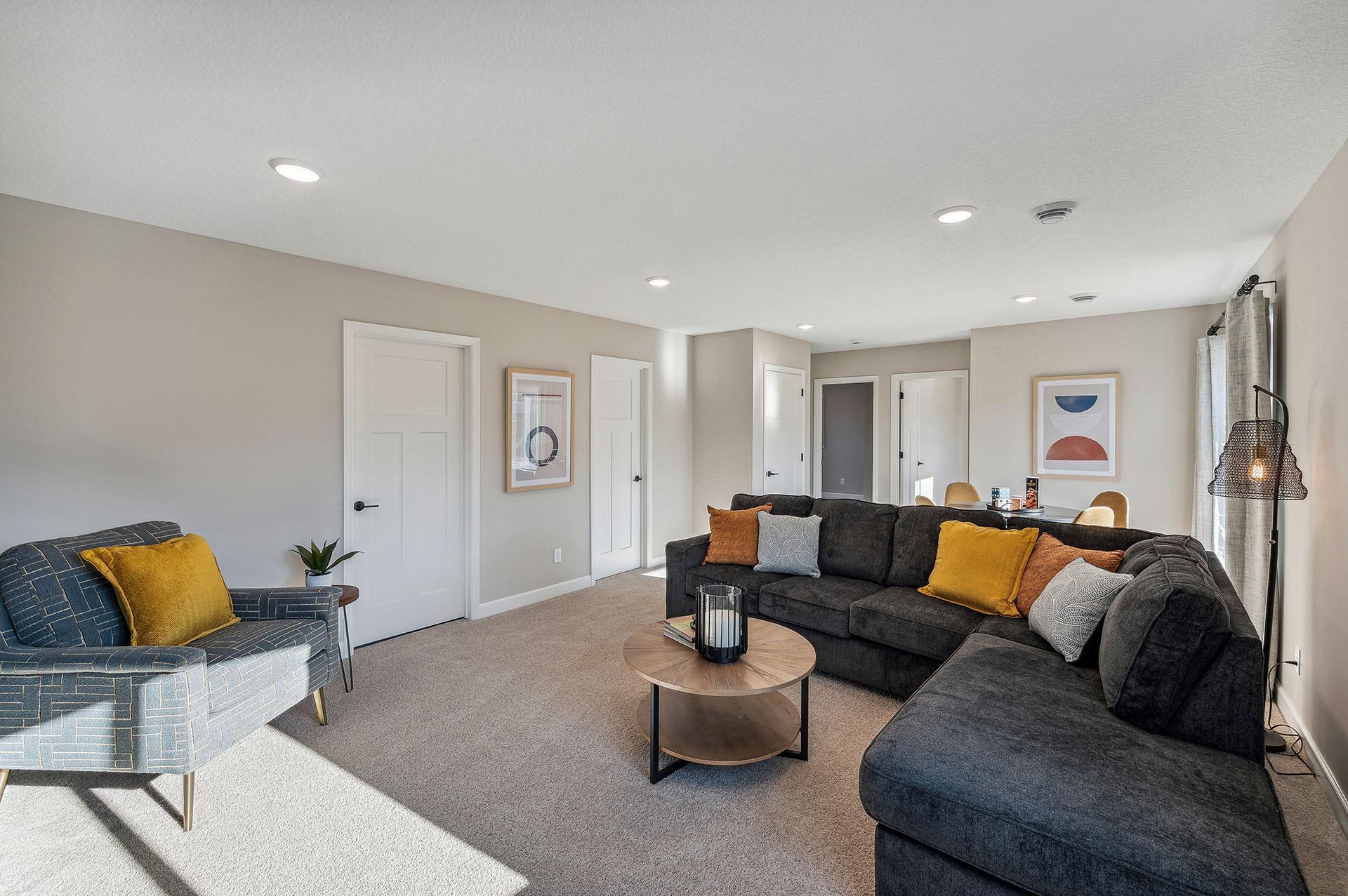 Lower Level Family Room - photo of a staged model home of the same floorplan. Selections may be different.