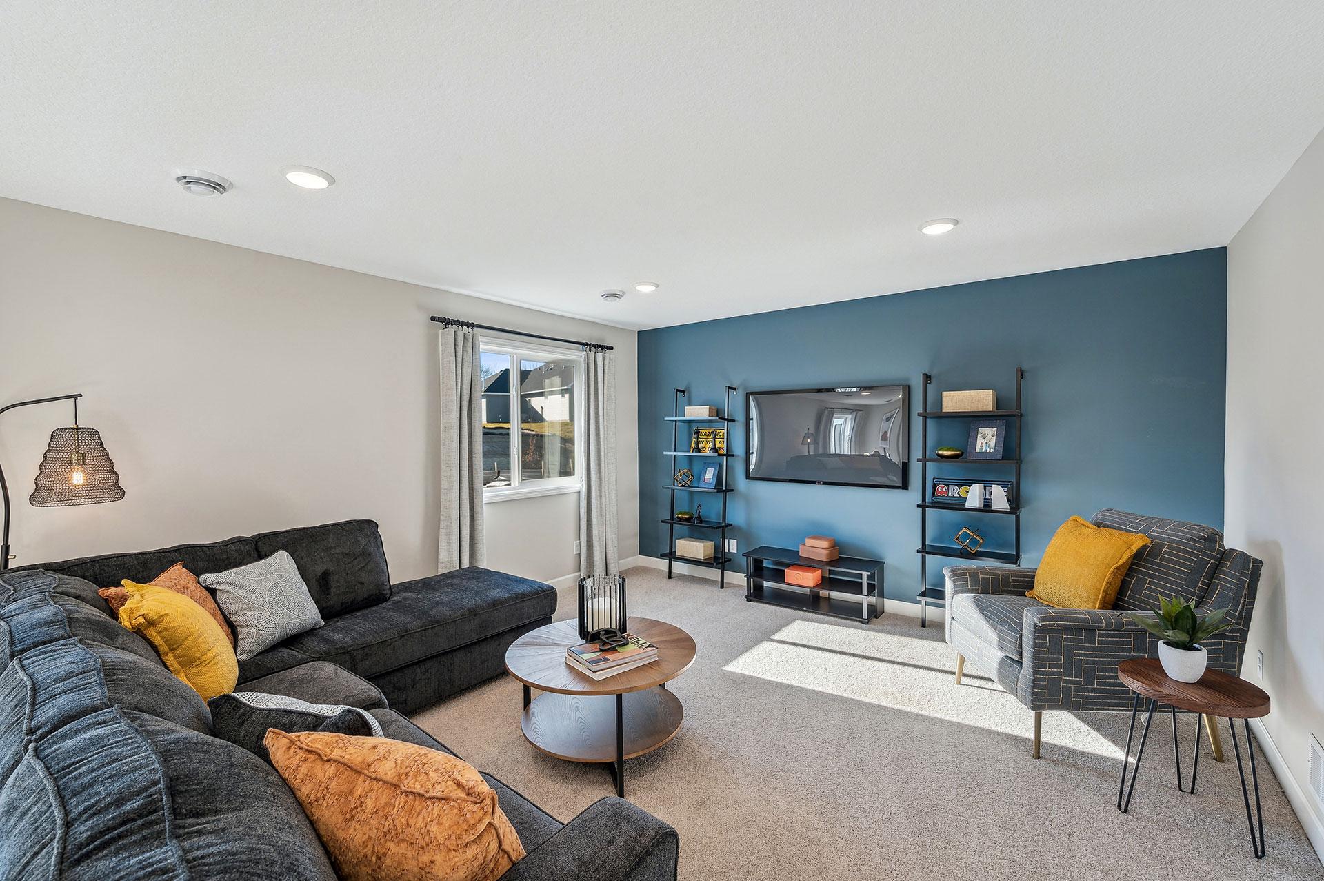 Lower Level Family Room - photo of a staged model home of the same floorplan. Selections may be different.