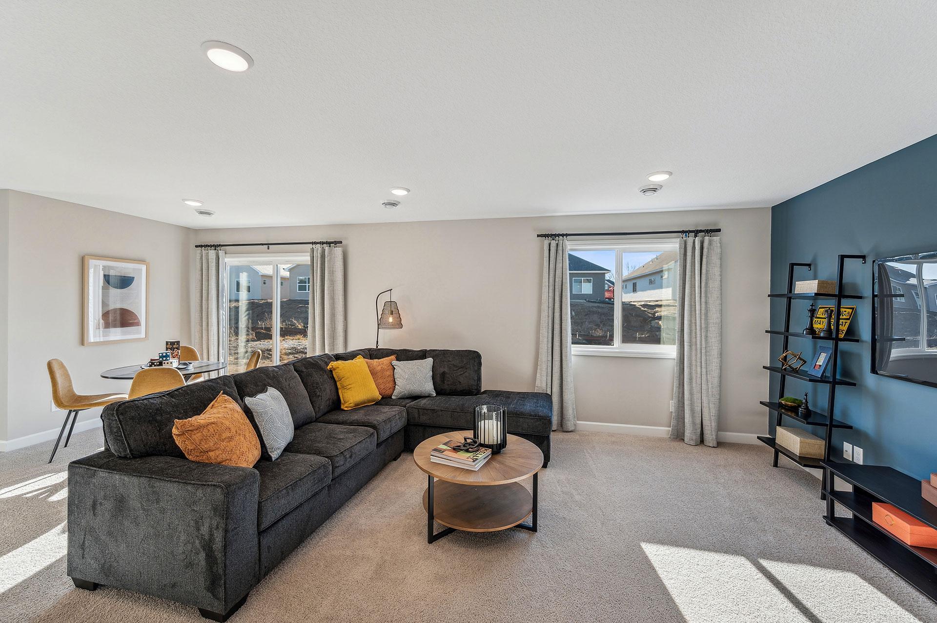 Lower Level Family Room - photo of a staged model home of the same floorplan. Selections may be different.