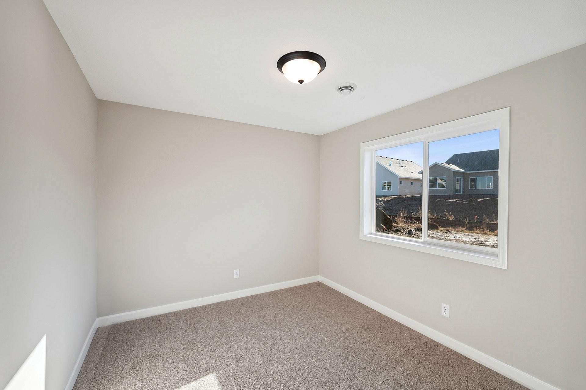 Lower Level Bathroom - photo of a staged model home of the same floorplan. Selections may be different.