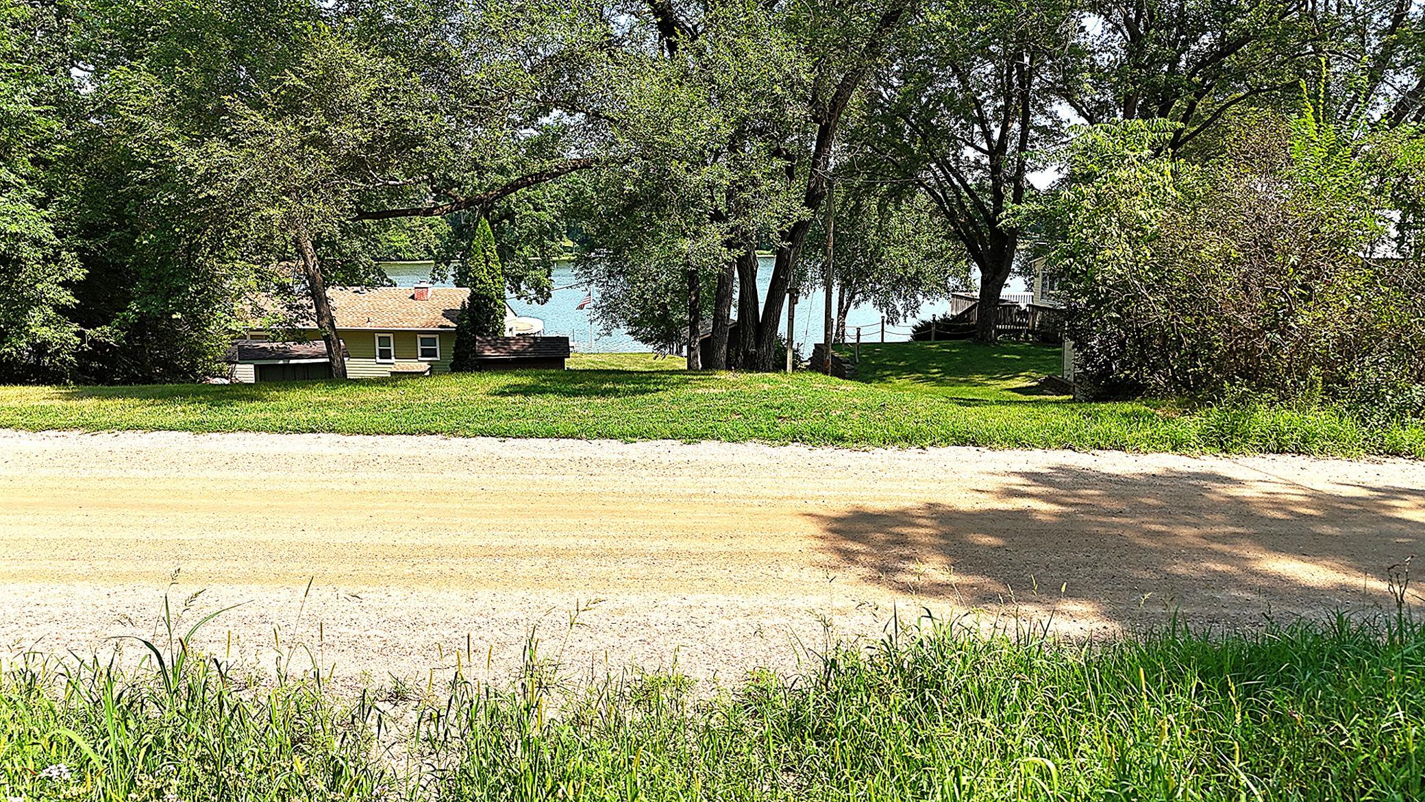 This is the view from the front of the lot on 109th St NW looking towards the lake.