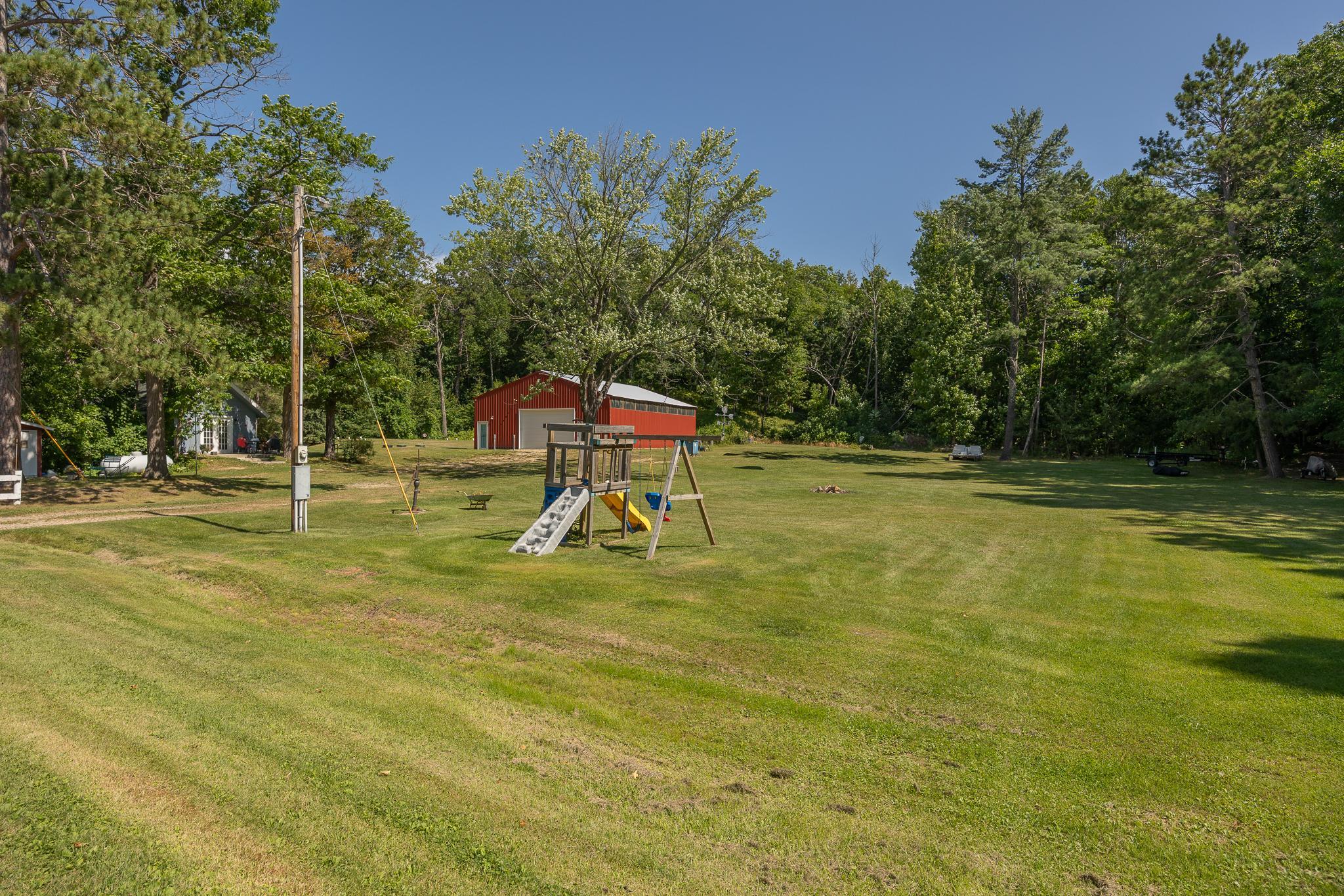 Large pole barn with year round bathroom and laundry area