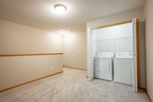 Upstairs features NEW CARPETING throughout, a spacious loft AND 3 large bedrooms, 1 full remodeled bathroom and a laundry closet with washer, dryer and shelving!