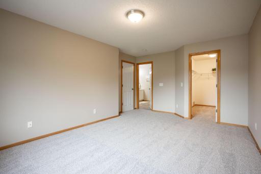 Primary Bedroom entry into bathroom and closet