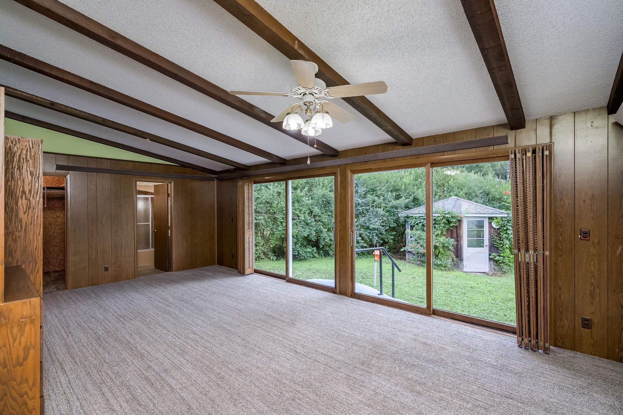 Double deck doors overlooking back yard