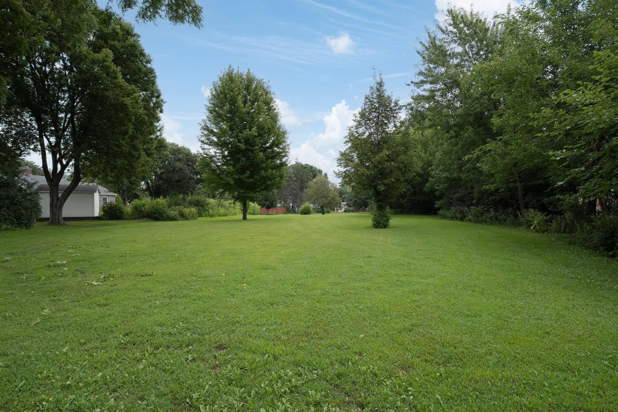 Quiet park behind home for yard games, picnics, dog walking or get togethers with neighbors.