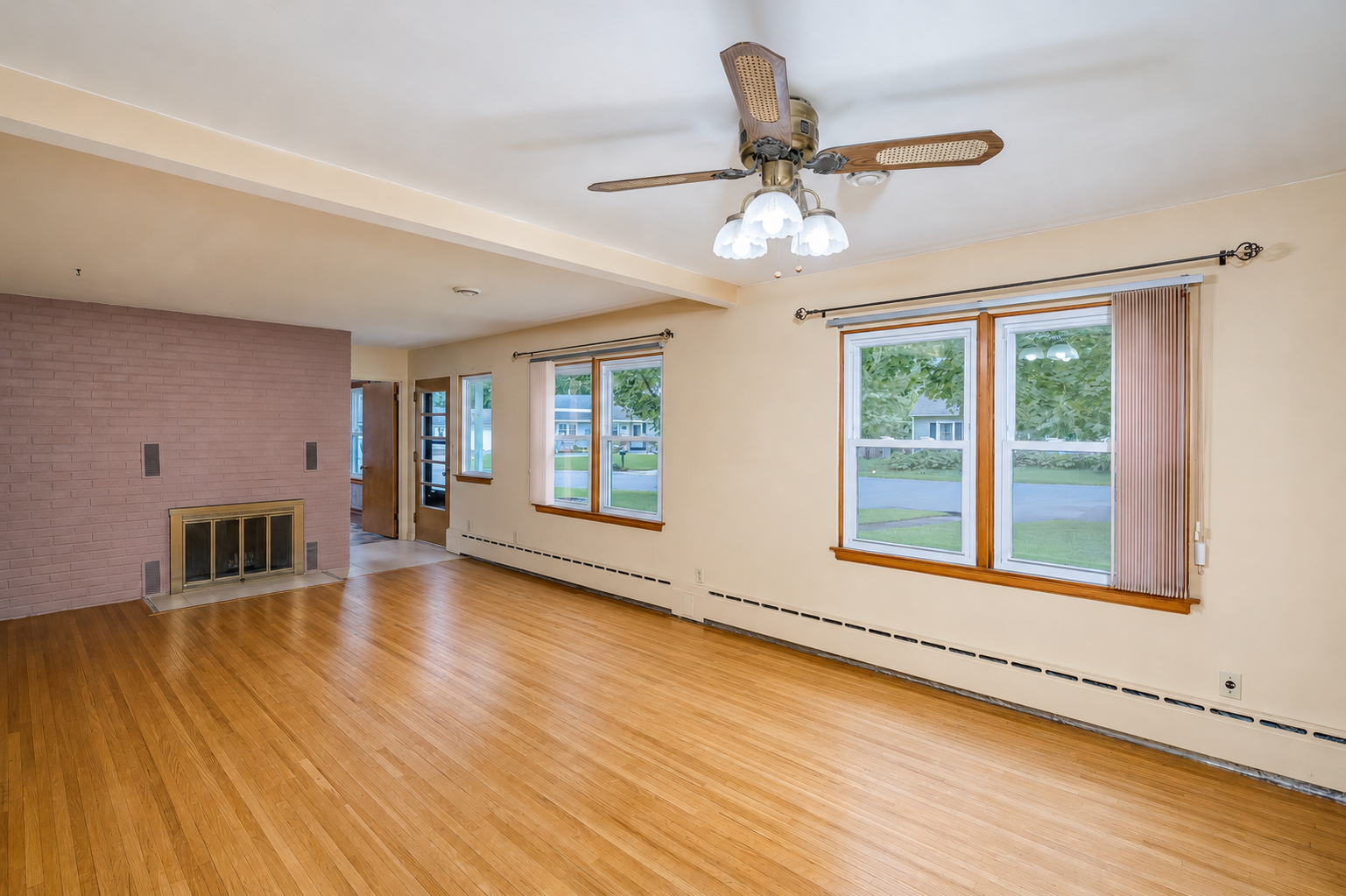 Livingroom with stain gone showing entry door.png