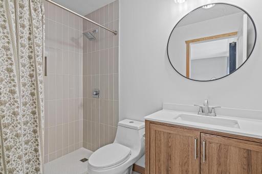Beautifully updated ensuite with modern style.