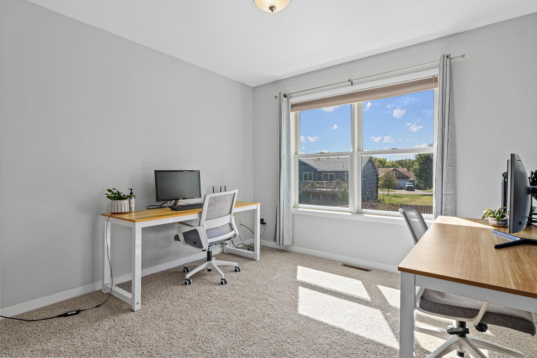Main level bedroom 3 set up as an office