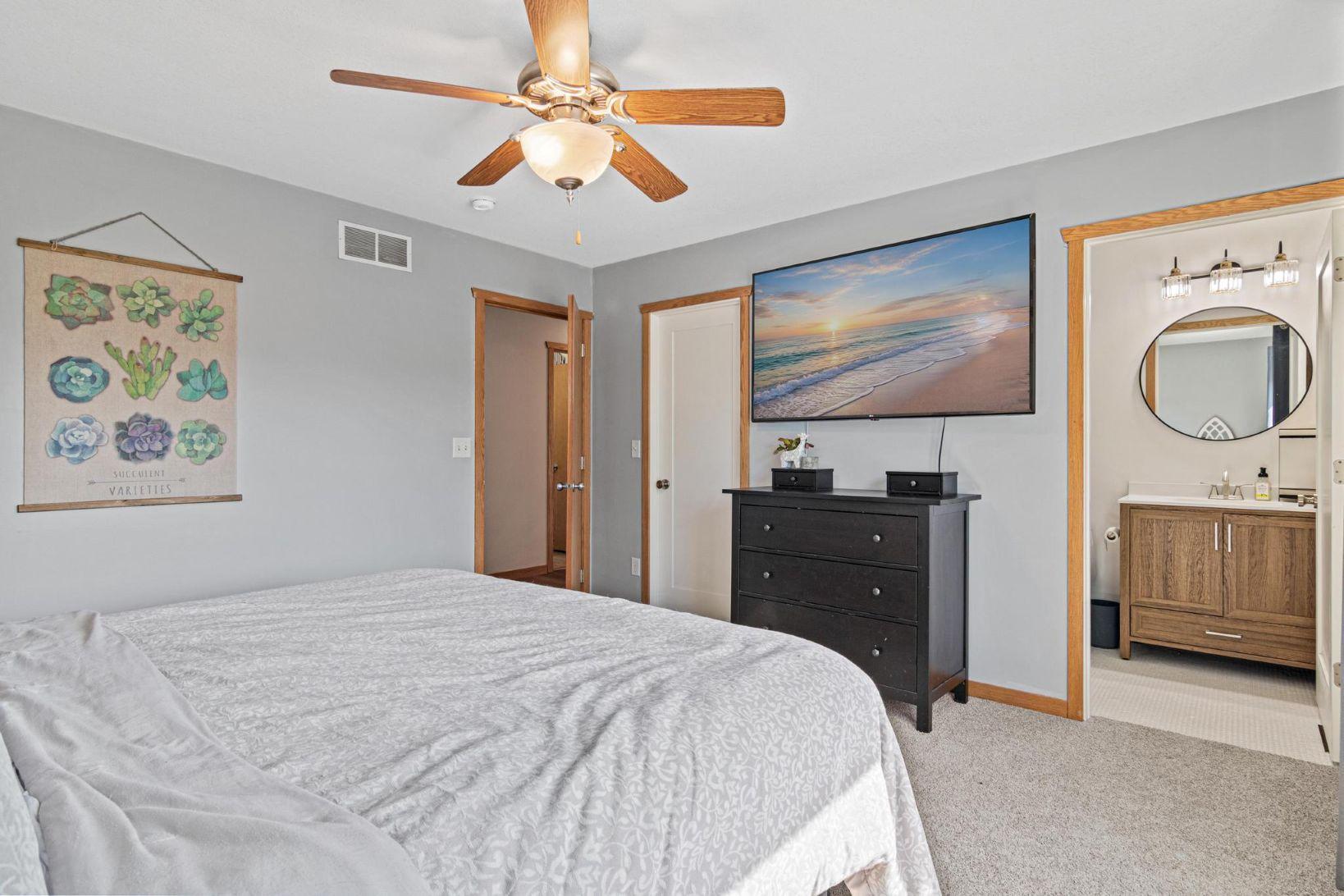 Primary bedroom with walk-in closet and en-suite bath