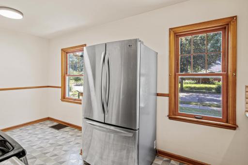 Stainless steel appliances and wonderful natural sunlight flows into the kitchen.