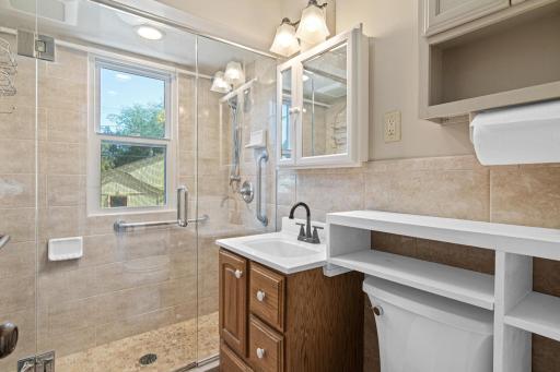 Main level bathroom was beautifully updated in 2019