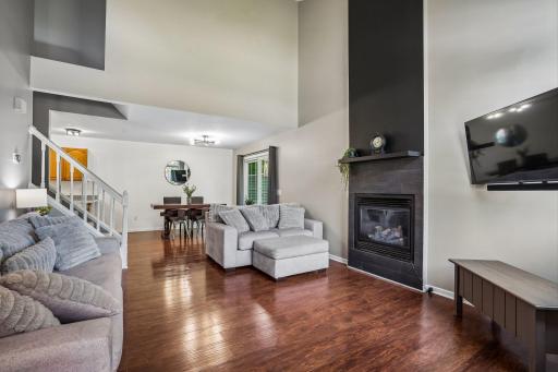 Open concept main level with fireplace as the focal point.
