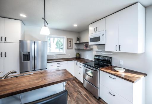 The kitchen is bright and cheery all day long