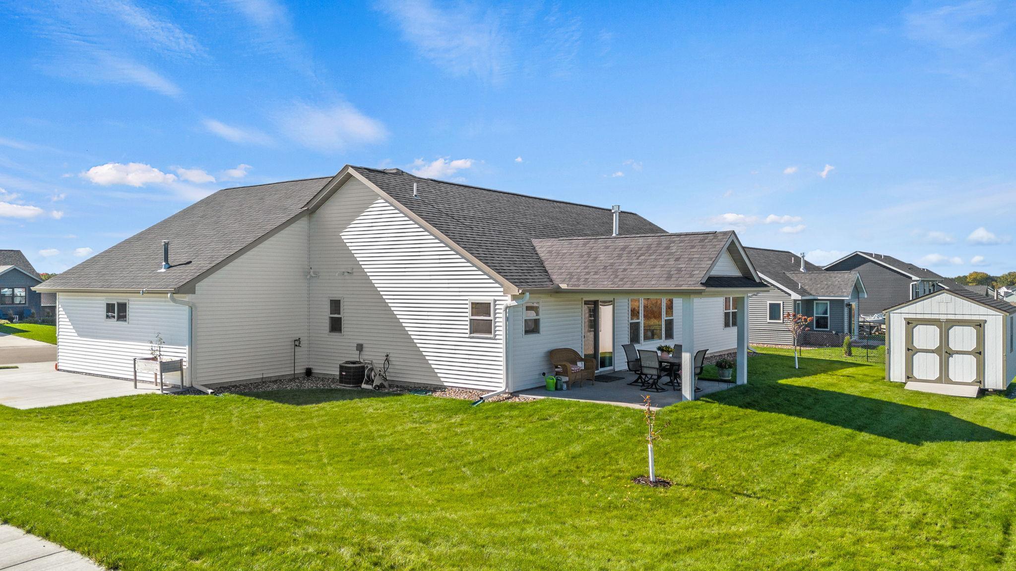 Back patio is covered and ready for you to enclose if you choose. 1895 Otter Way New Richmond-26.jpg