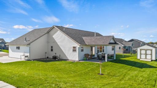 Back patio is covered and ready for you to enclose if you choose. 1895 Otter Way New Richmond-26.jpg