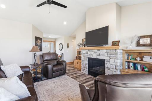 The generous entry has a coat closet and large bench and opens to this cozy living room! 1895 Otter Way New Richmond-06.jpg