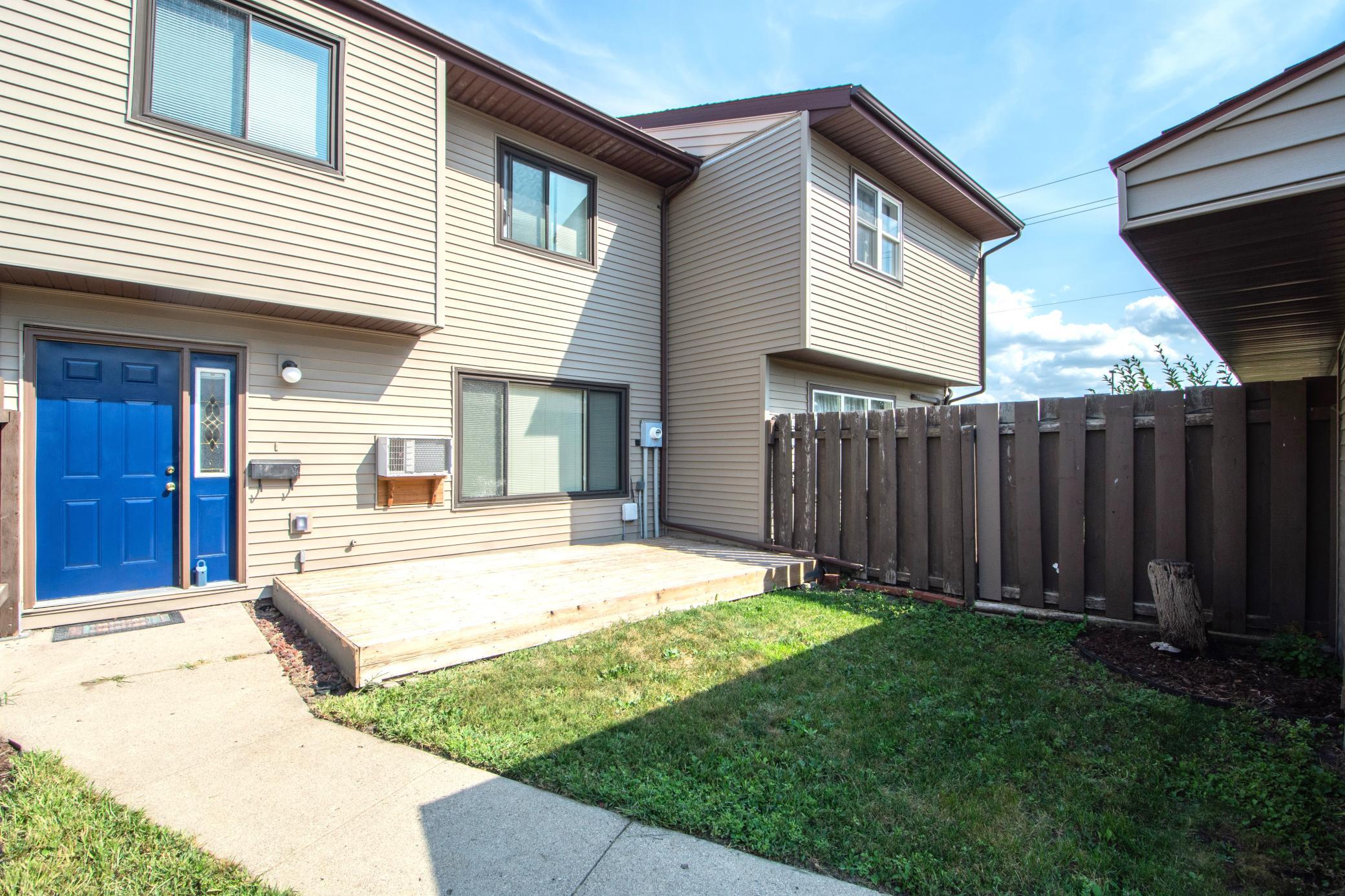 fenced yard with deck