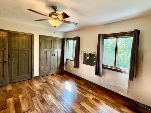 Bedroom 2- solid wood doors & custom blinds