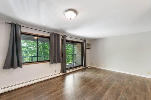 Spacious living area walks out to covered deck