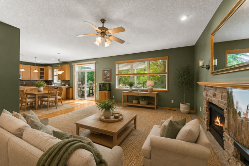 Main Floor Living room with Gas fire place open to both formal and informal dining and kitchen!