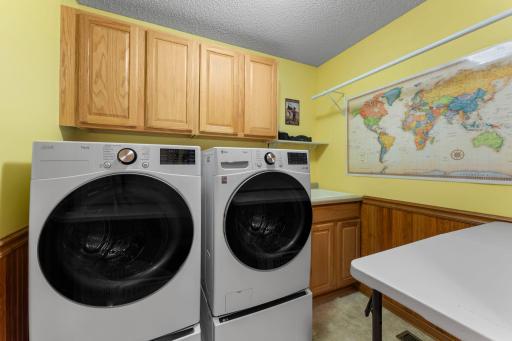 Upper level laundry room right off the Primary Bedroom Suite