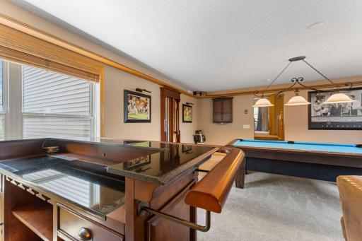 Bonus Rec Room Above the garage space with model train track chugging around the room!