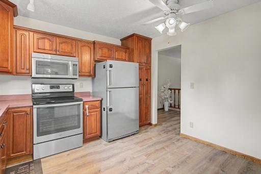 Functional kitchen featuring abundant cabinetry and stainless-steel appliances.