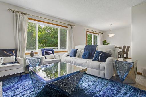 Spacious main-level living area flowing into the dining room.