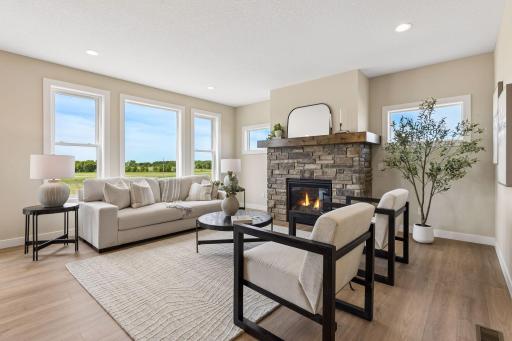 An abundance of natural light fills this living room, creating a bright, welcoming space that feels warm and inviting all day long.
