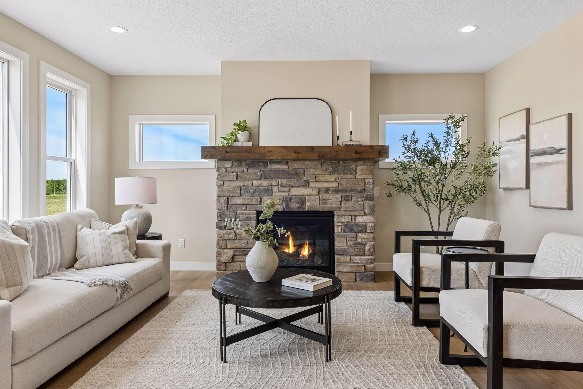 Stunning gas fireplace with stone surround and mantle!