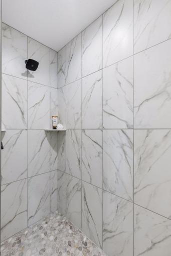 Beautiful tile shower in the private primary bath!