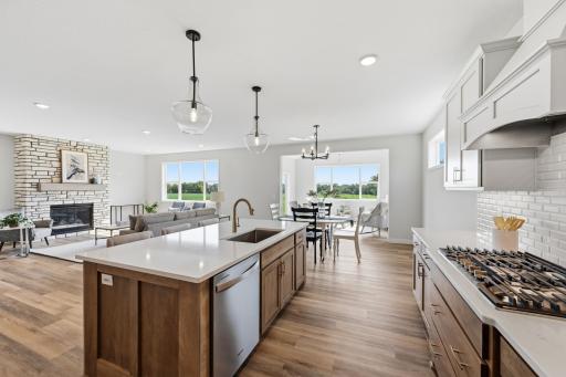 Gourmet Kitchen with Custom Winged Wall Island