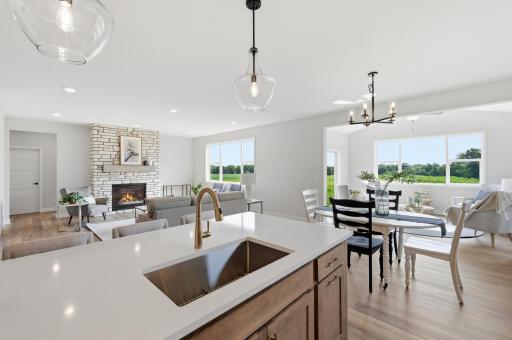 Photo for 10180 Heather Lane, Corcoran, MN 55374 - listing #7122743 Entertainer's Dream! Morning Room and Living Room with tons of Natural Light! Stone to Ceiling Gas Fireplace!