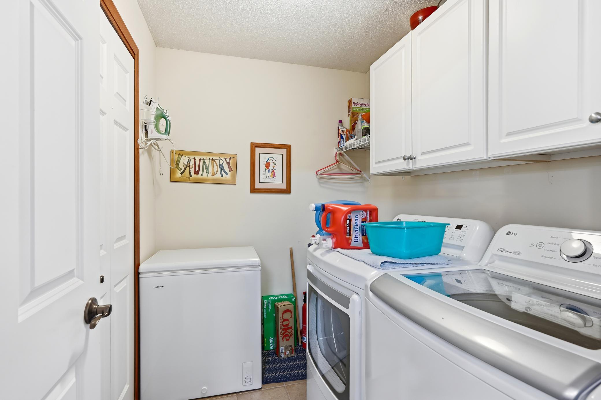 Main-floor laundry and the utility room.
