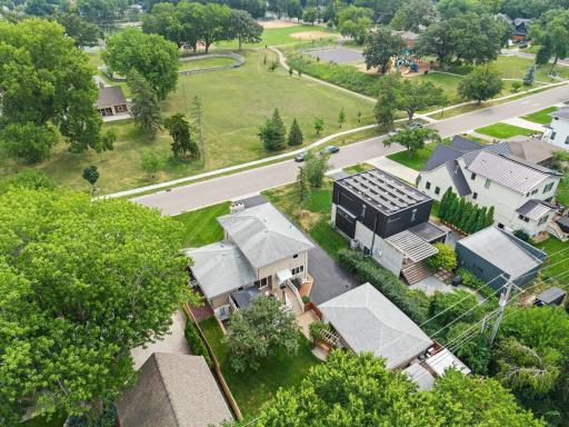 An aerial view confirms the home's premier location directly across from Weber Park, with its ball field and playground just steps away.