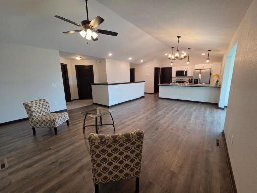 *ACTUAL PROPERTY* living room, dining room, kitchen, sunroom