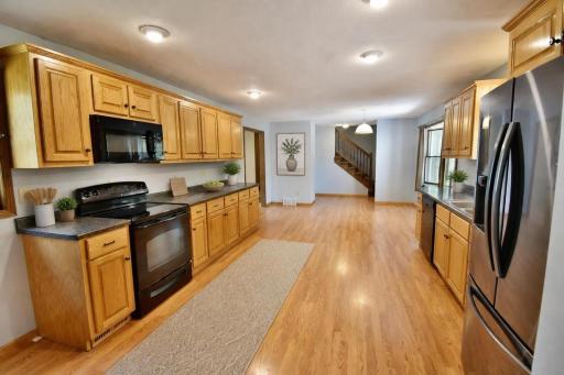Spacious and open kitchen dining with loads of counter space, cupboards, and a pantry!!!