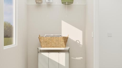 (Rendering, actual home's finishes will vary.) The laundry room is located on the same level as all the bedrooms in a thoughtful design to get weekly chores done in a snap.