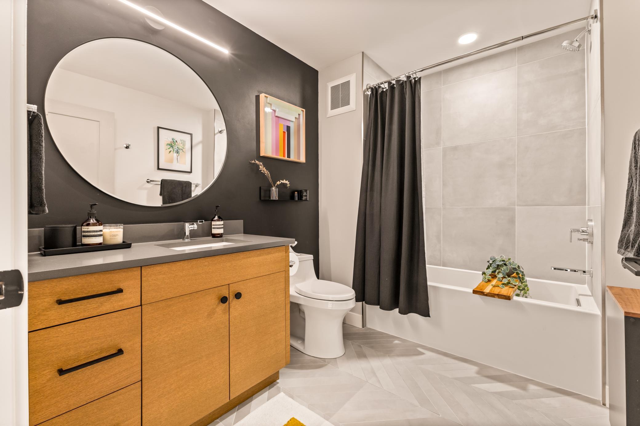 Secondary Main Level Full Bathroom with Tiled Floors & Shower