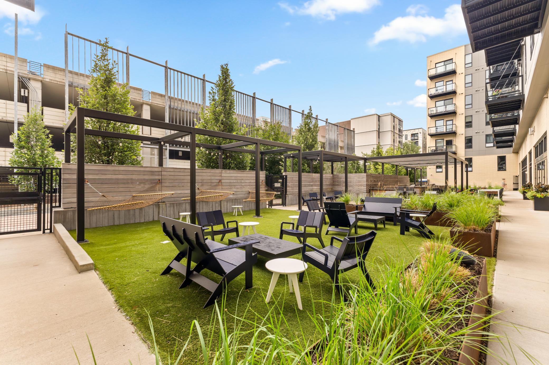 Turf Patio with Outdoor Grills and Lounge Space + 205 Bark Dog Run