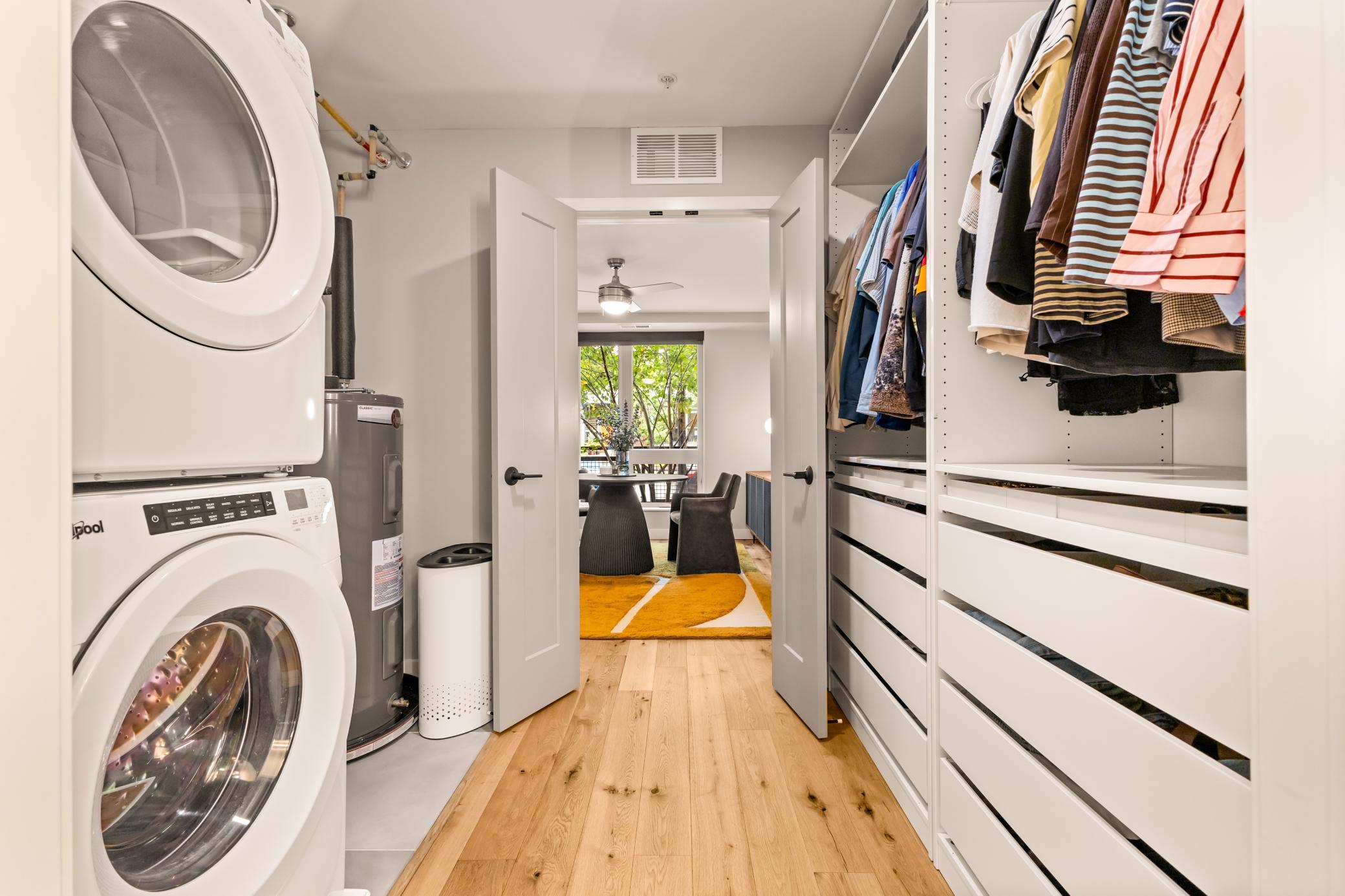 Primary Walk Through Closet with Laundry and Custom Built-In Organization System