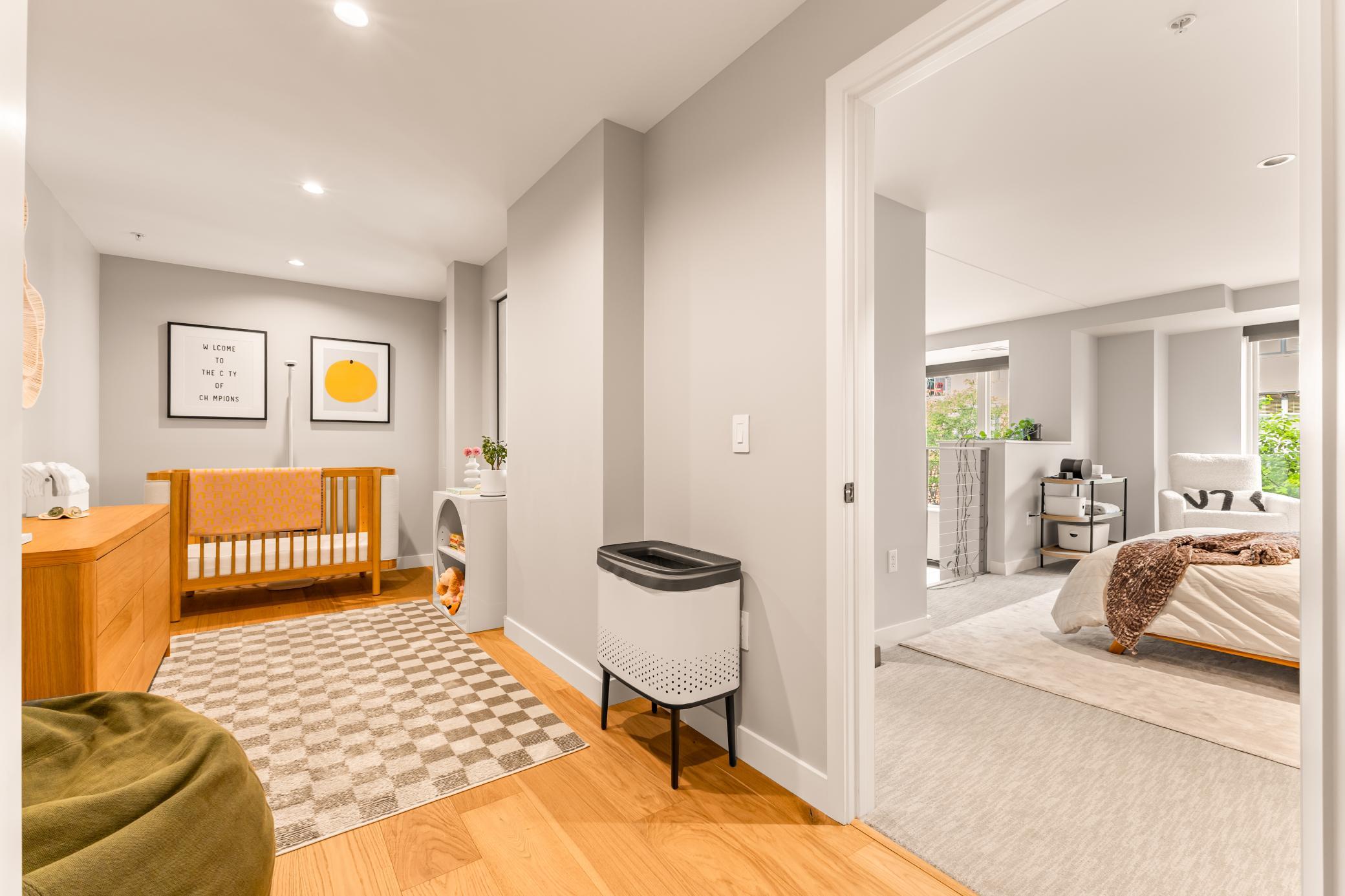 Upper Level Addition Included Expanding Existing Closet Adding 80 Square Feet, Hardwood Floors, Transom Windows Overlooking ML, Lighting, and Closet System