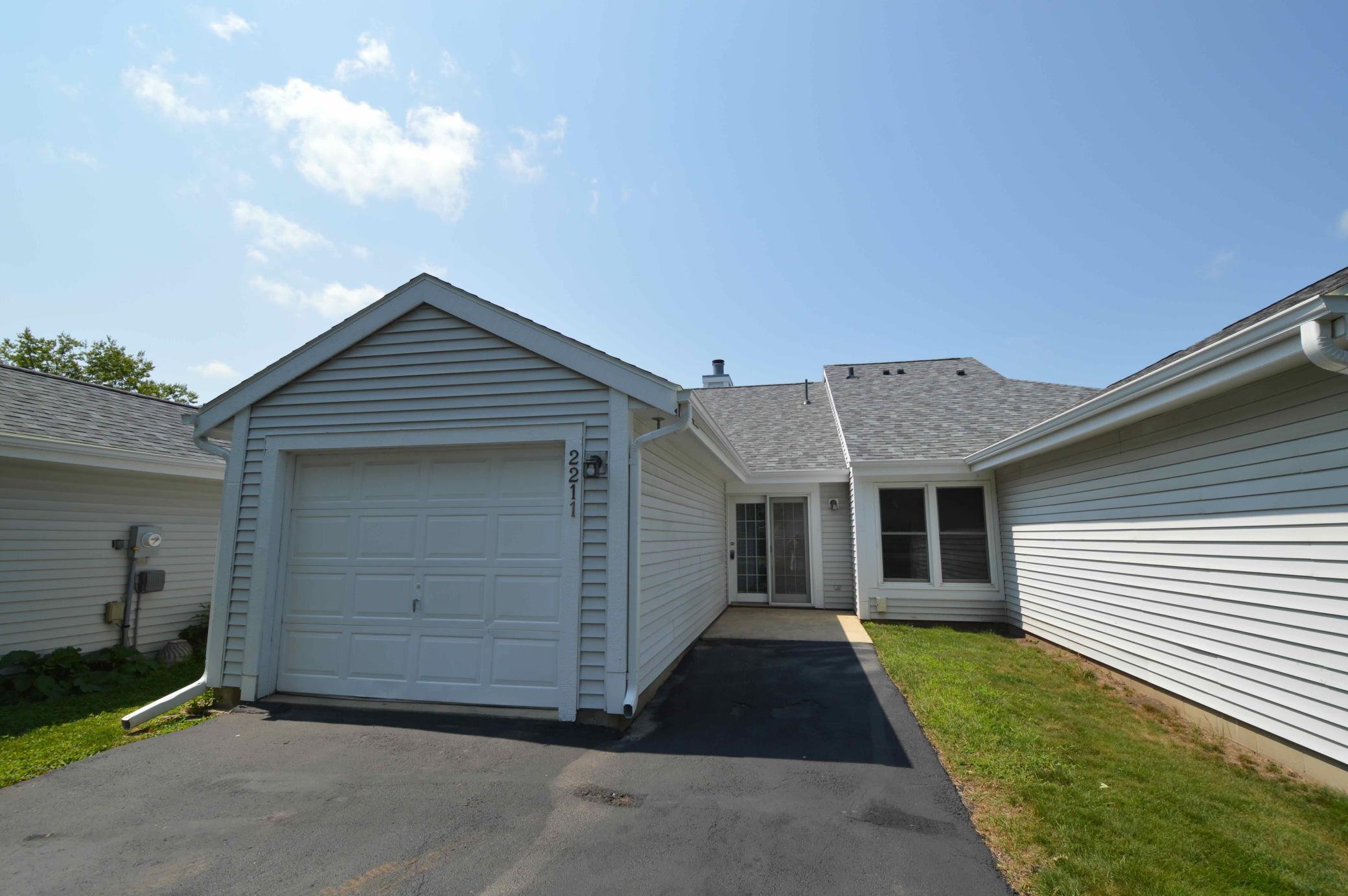 Backside of Townhouse - Patio and Garage