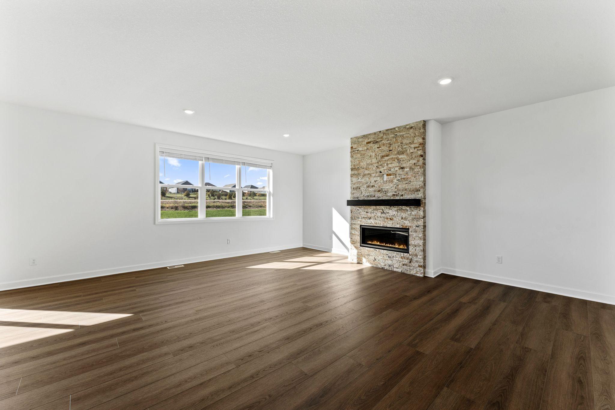 Curl up with a good book or enjoy family movie nights in the spacious yet cozy Great Room.
