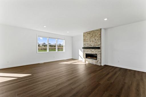 Curl up with a good book or enjoy family movie nights in the spacious yet cozy Great Room.